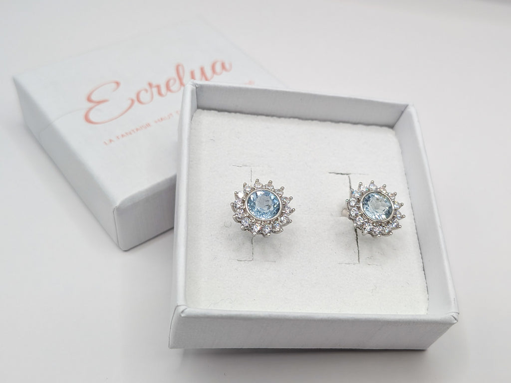 Puces fleur topaze bleue naturelle en argent 925 | Ecrelya Prestige