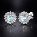 Puces fleur topaze bleue naturelle en argent 925 | Ecrelya Prestige